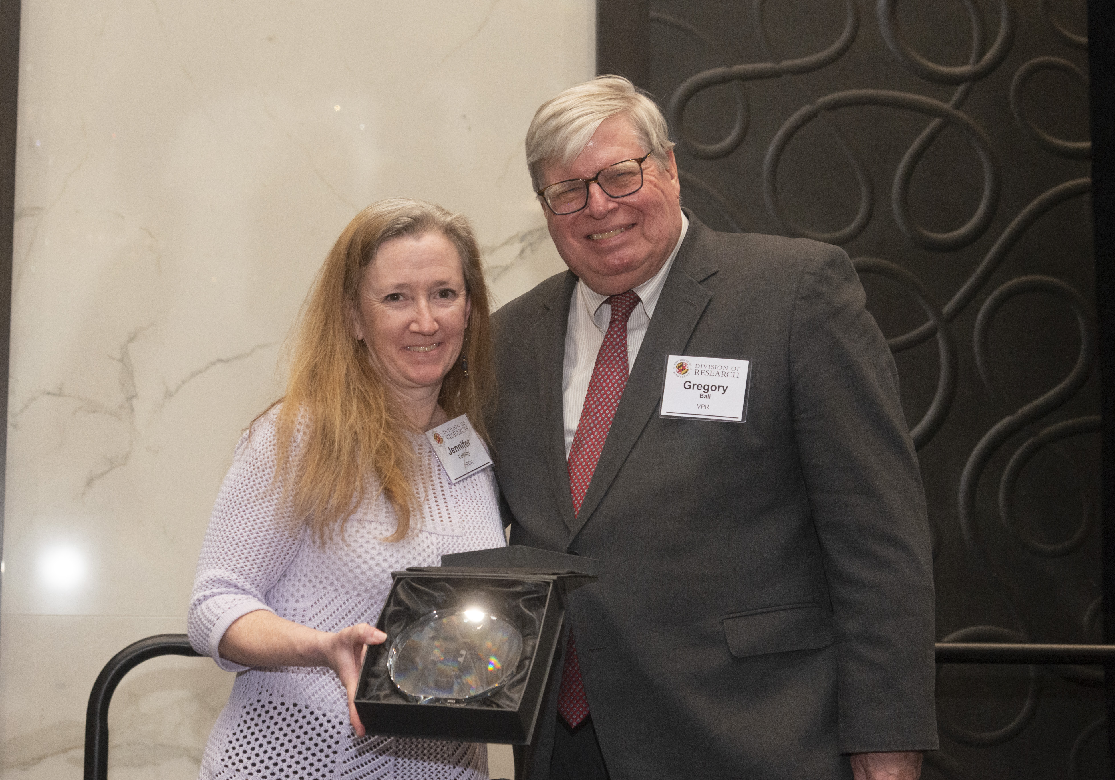 Jennifer Cotting receives award from VPR Gregory Ball