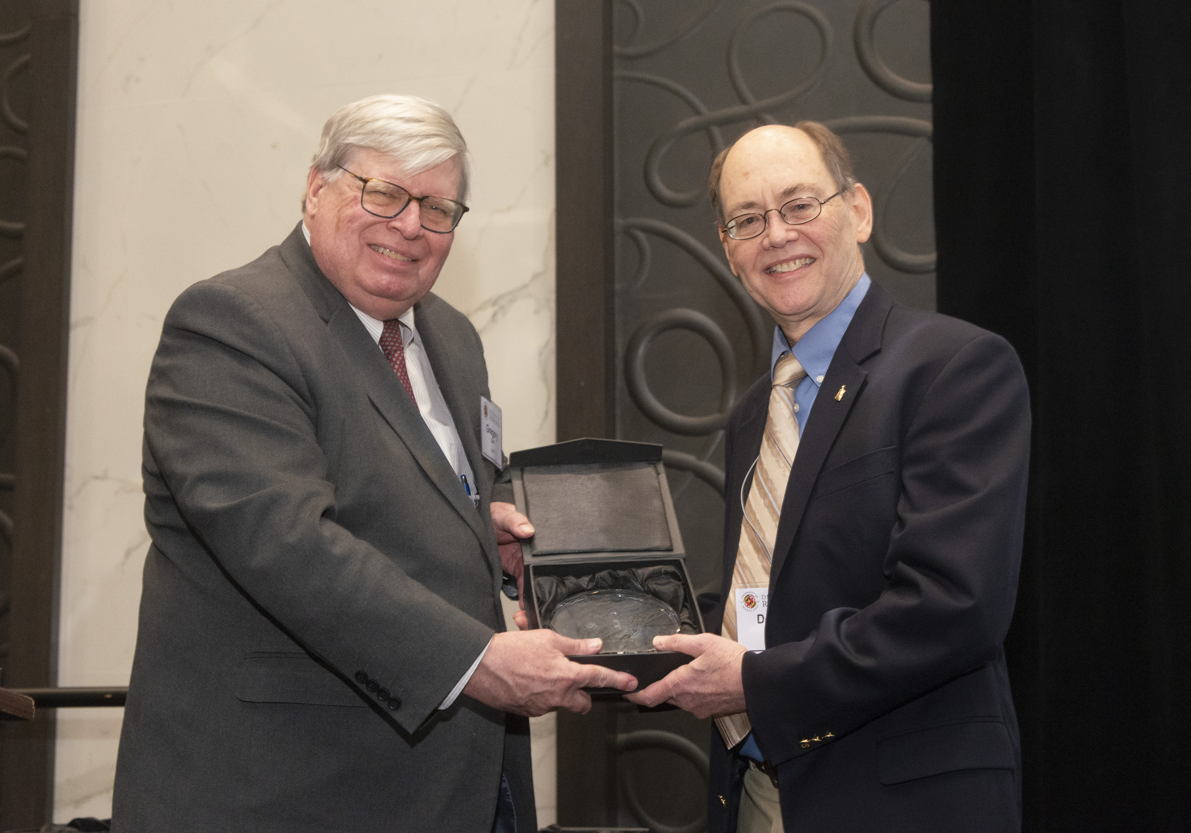 Donald Milton receives award from VPR Gregory Ball