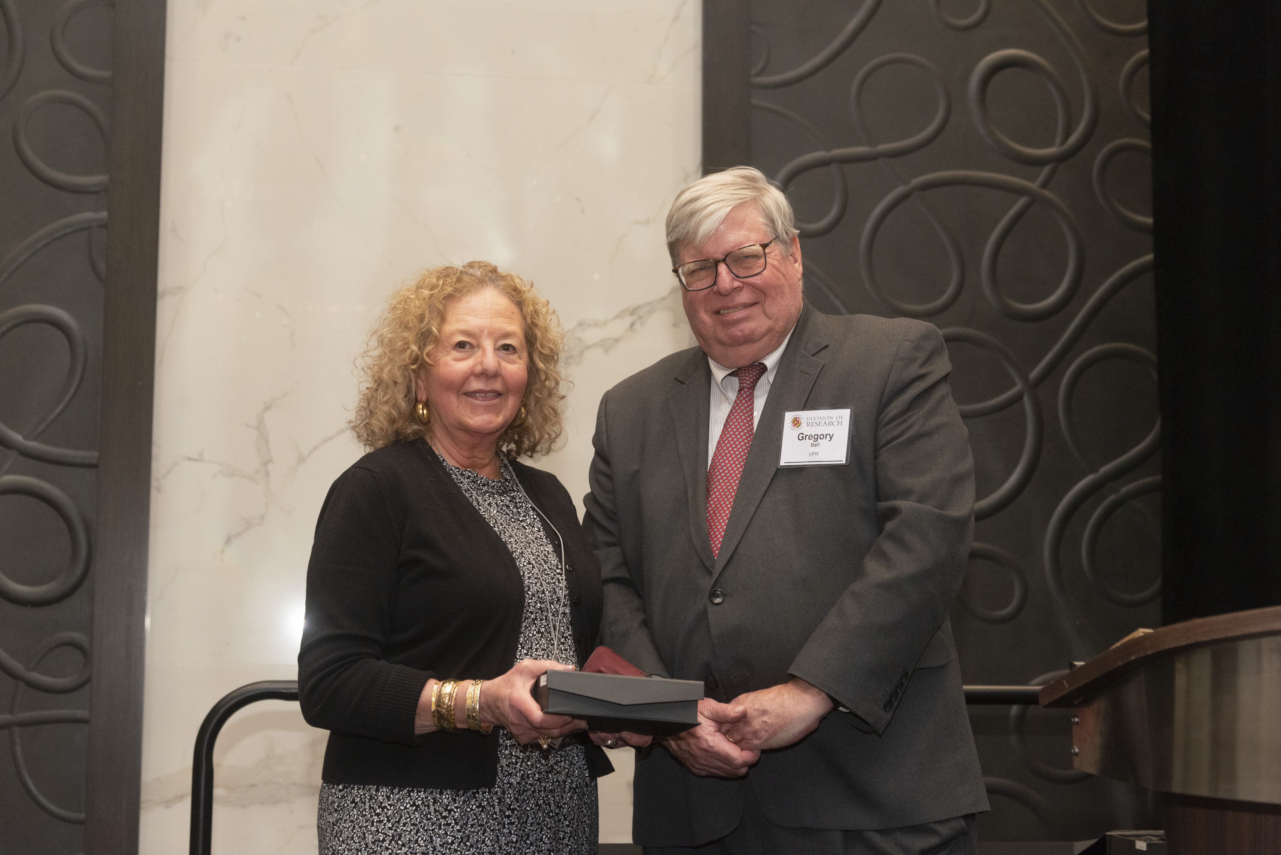 Ruth Zambrana receives award from VPR Gregory Ball
