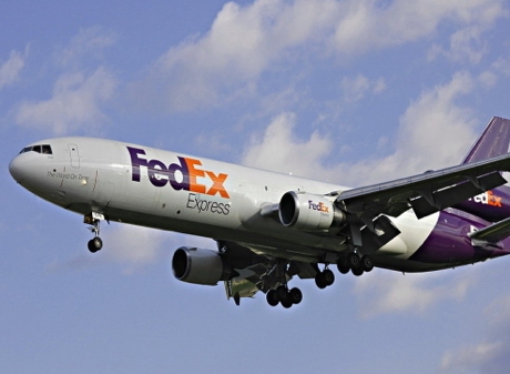 FedEx branded airplane coming in for a landing