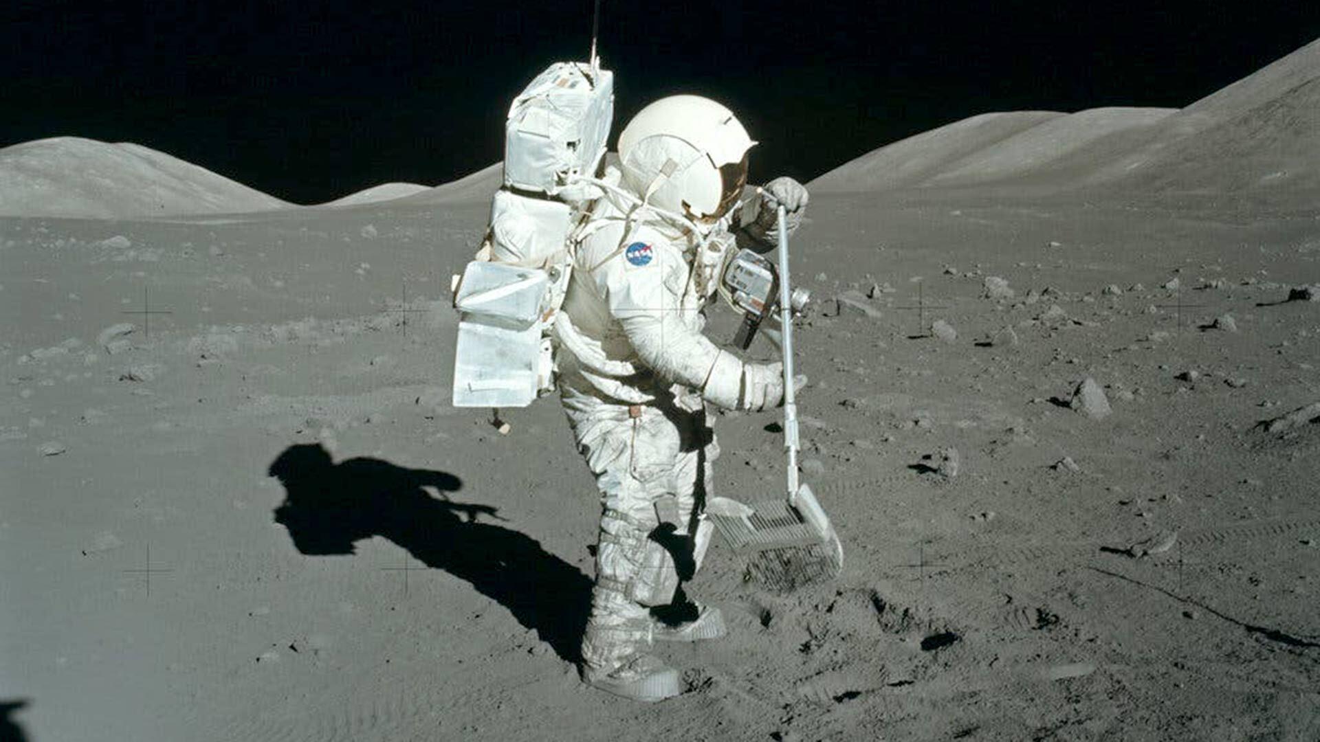Apollo 17 astronaut Harrison Schmitt collects rocks on the final manned moon mission in 1972. With a new NASA grant, UMD researchers are creating a lunar-surface spectrometer to help analyze the composition of the moon, preparing the way for human exploration and colonization of Earth's satellite.