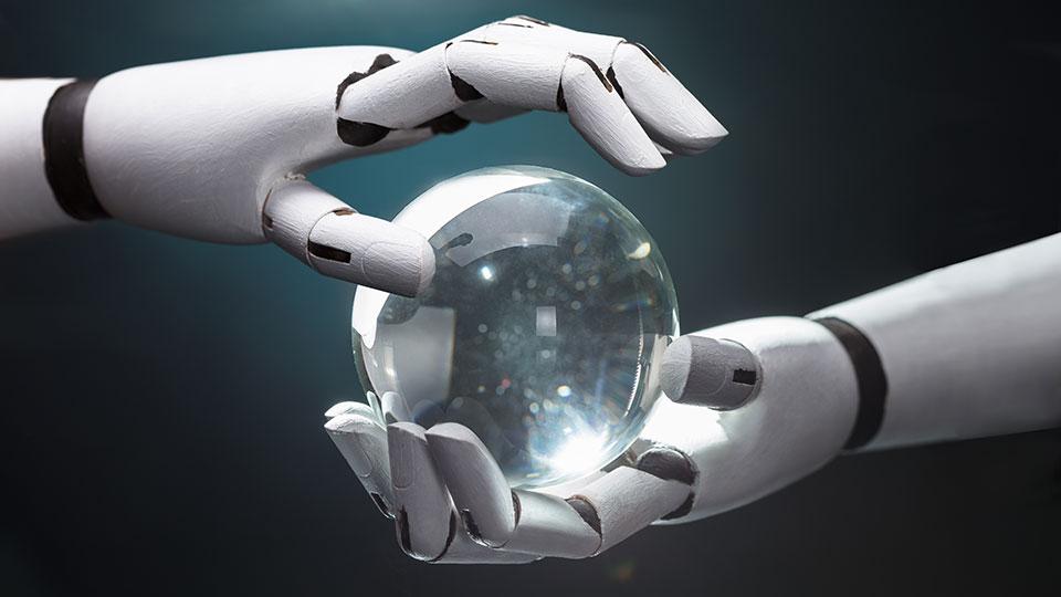 Robot hands holding crystal ball