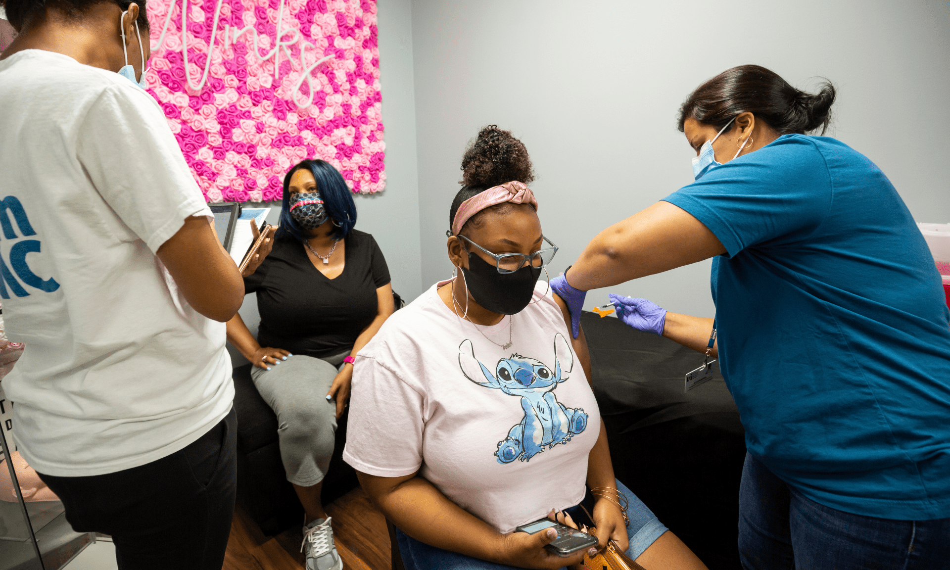 Woman getting vaccinated