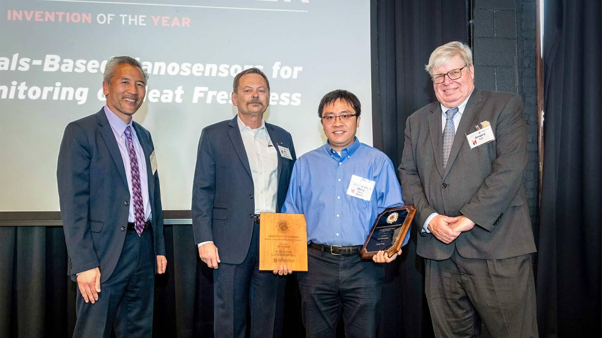 Cheng Gong wins Overall Invention of the Year at Innovate Maryland, alongside Dean Chang, Ken Porter, and Gregory Ball