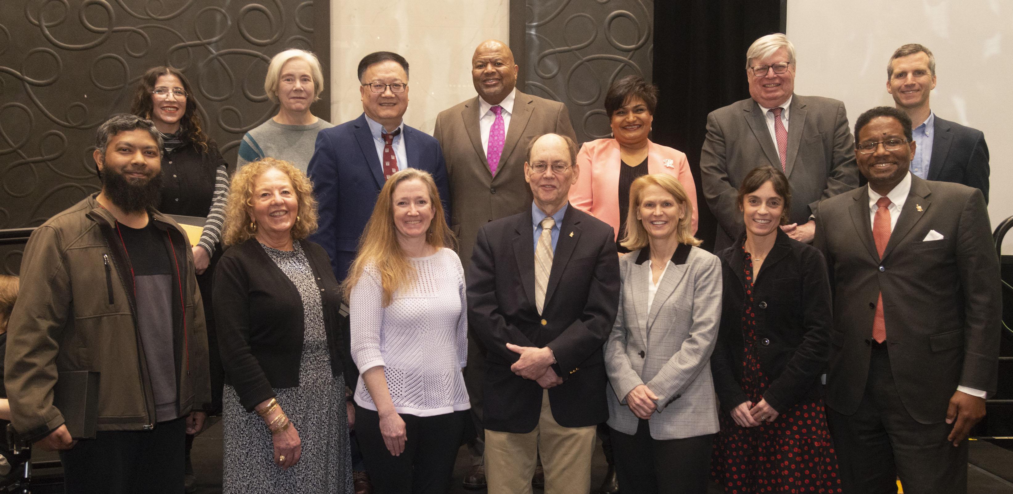 MREC honorees pose with the President, Provost, and VPR