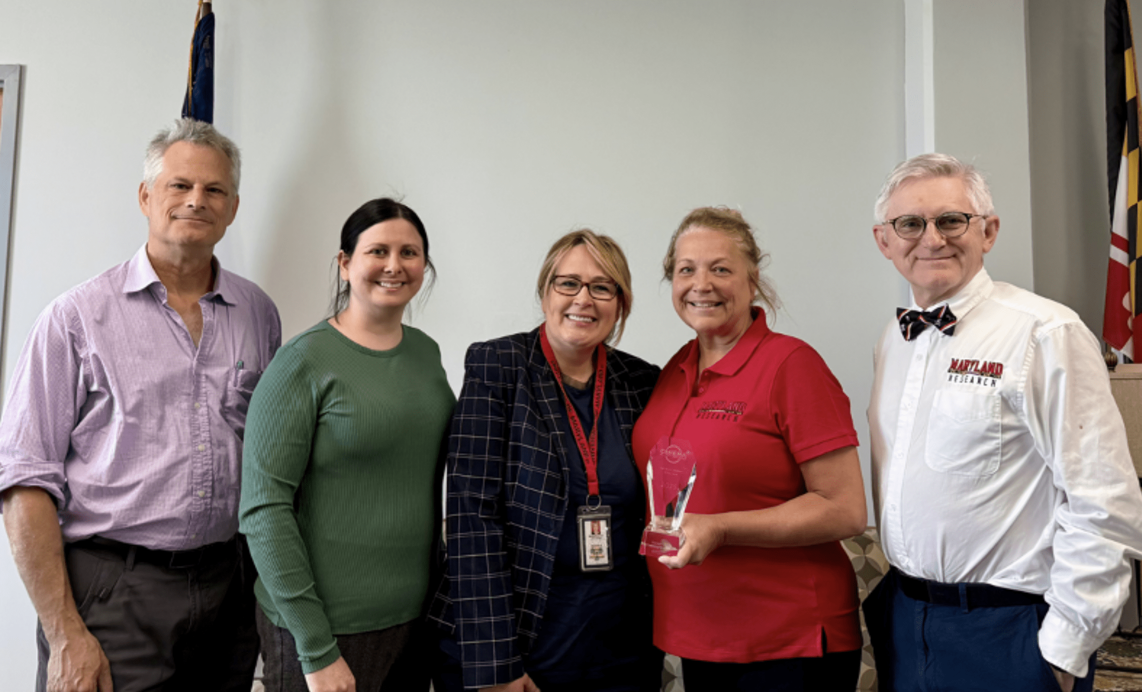 University of Maryland representatives at the Campus Leaders Who Care Award Ceremony. (Left to right): Jason Kahn, Associate Professor, College of Computer, Mathematical, and Natural Sciences—Chemistry & Biochemistry; Miriam Sharp, Assistant Director for Academic & Laboratory Safety/Chemical Hygiene Officer, ESSR; Mary Dorman, Executive Director, ESSR; Denise Clark, Associate Vice President for Administration, Division of Research; and Patrick O’Shea, Vice President for Research, University of Maryland.